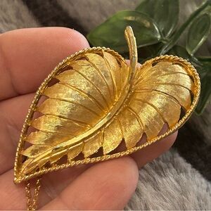 Vintage 60s B.S.K. gold di-cut textured leaf brooch